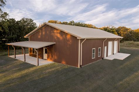 metal building next to house|metal building homes magazine.